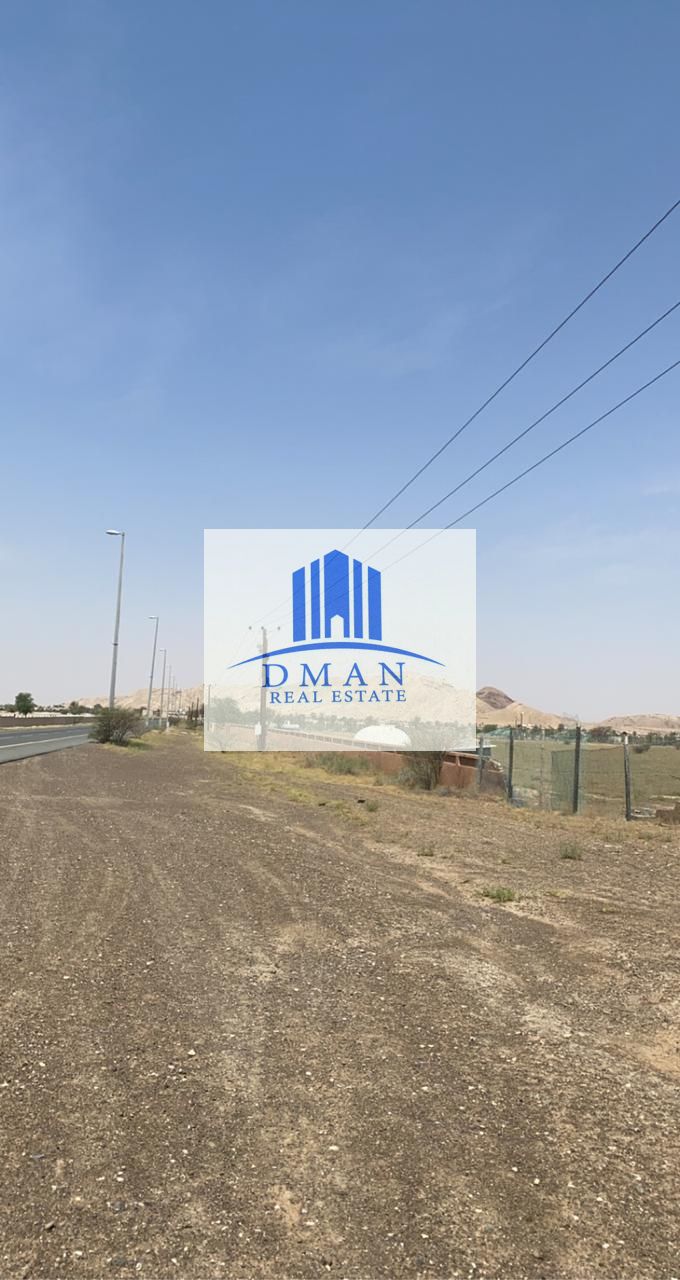 For sale, 4 commercial, residential, and agricultural lands in Al Madam, on a main street