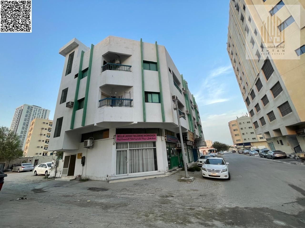 For sale, a residential-commercial building in Ajman Emirate, Liwara 1 area. The building is situated on a land area of 3,232 square feet and a built-