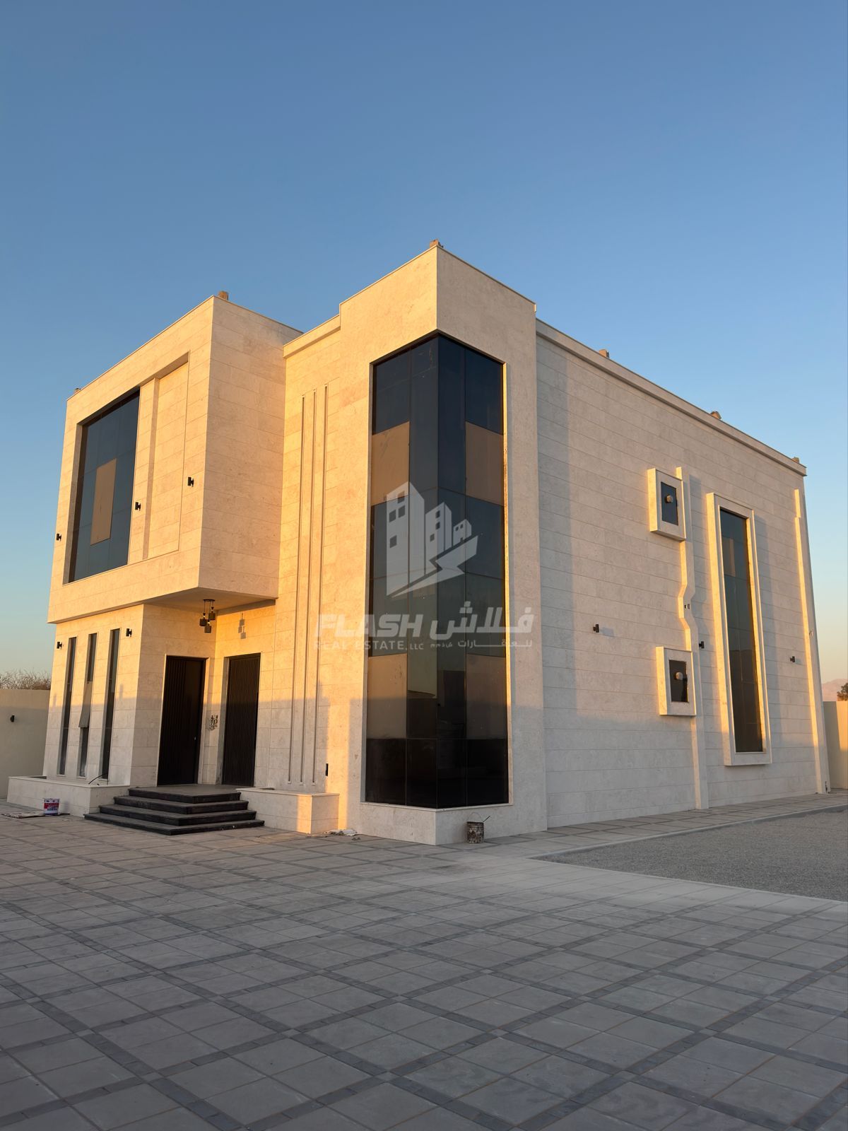 For sale, a two-story, modern stone villa in Ras Al Khaimah