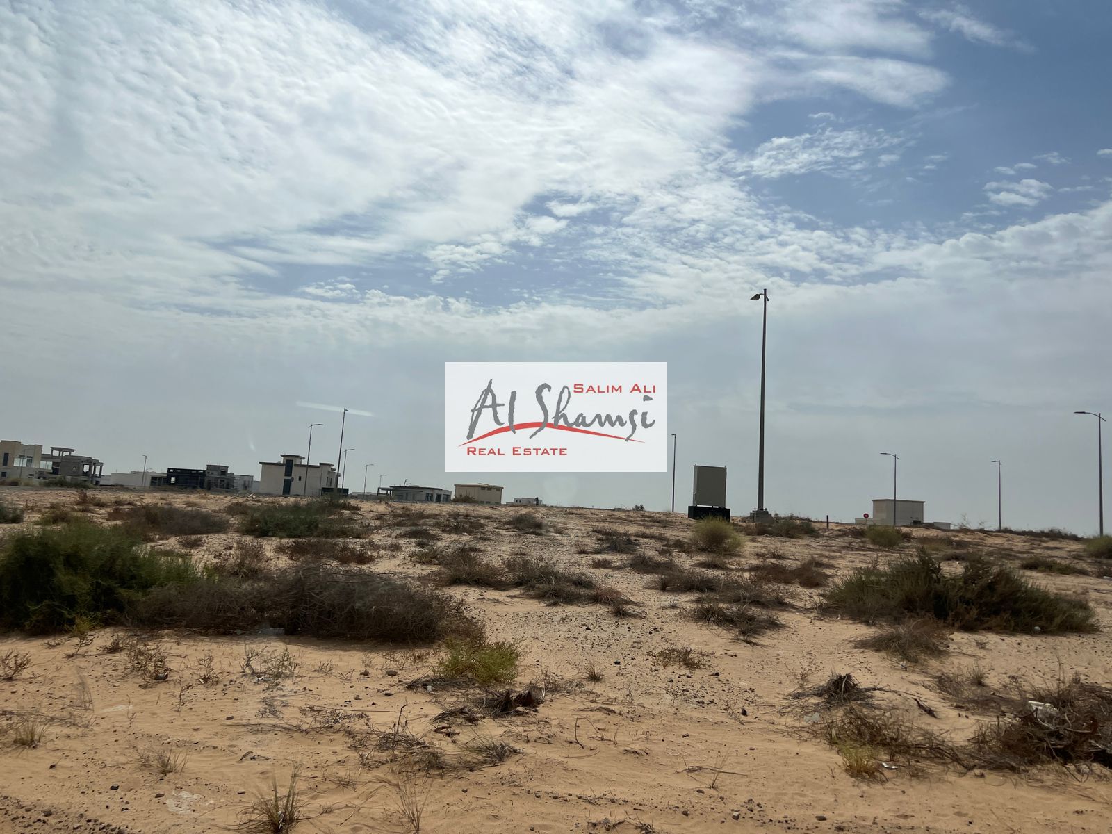 For sale commercial land in the - Sharjah , Tilal City