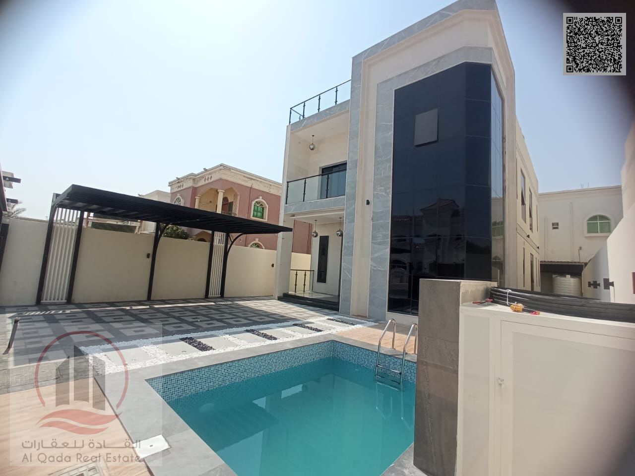 For sale, a villa in Ajman, Al Rawda, 5 master bedrooms, a living room, a swimming pool, and a maid's room. Freehold for all nationalities. (Including