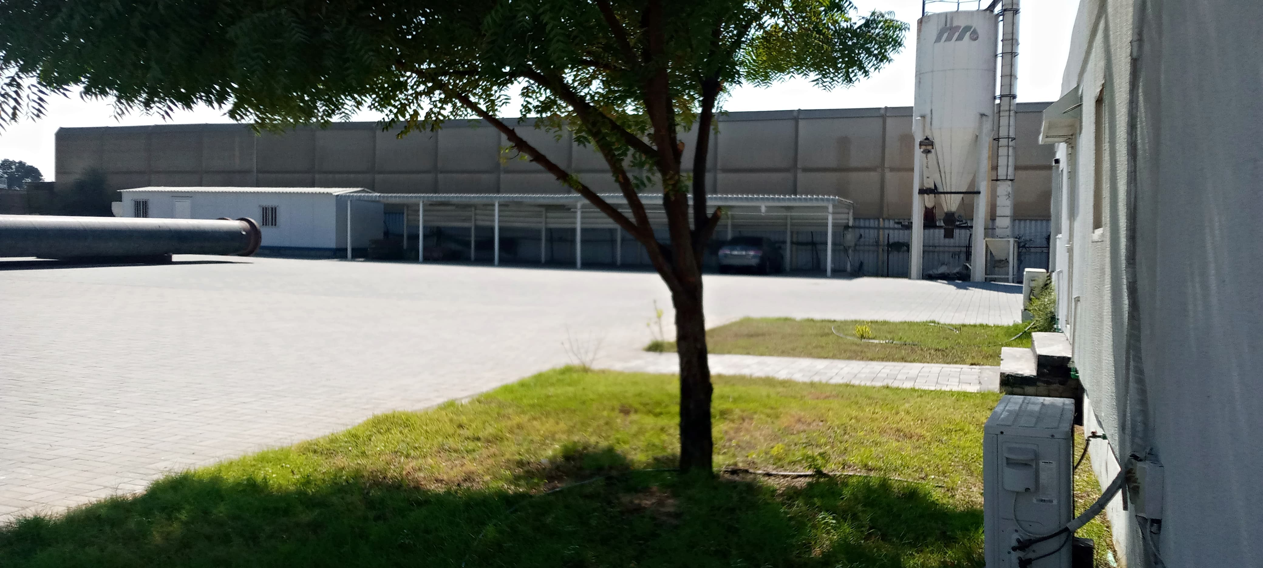 Warehouse with office and storage yard for sale