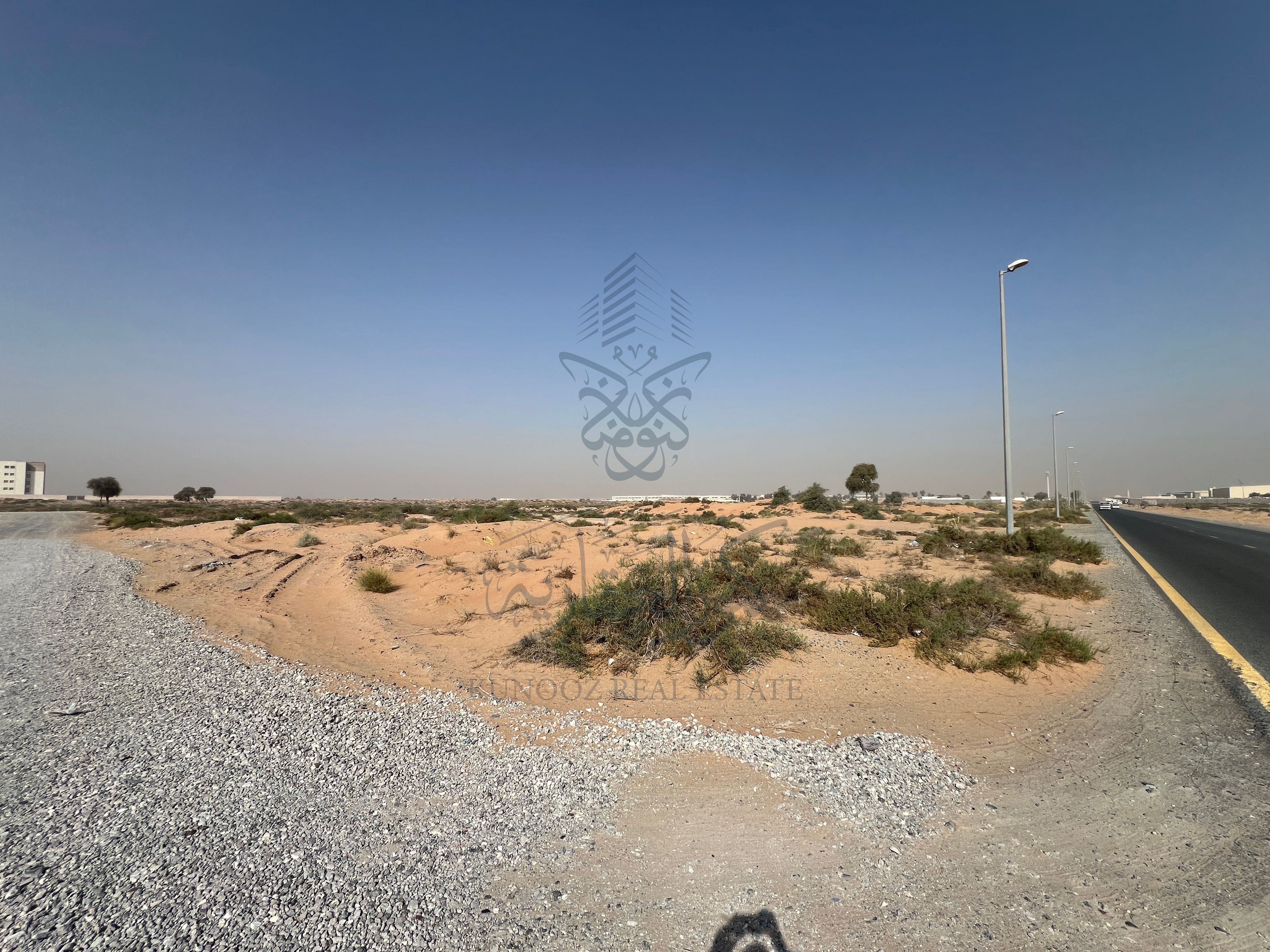 For Sale – Fenced Industrial Plot in Al Sajaa