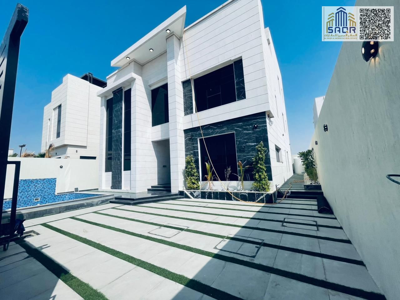 Own a villa in the most upscale areas of Ajman with a private pool on a public street, close to all services and government interests, freehold