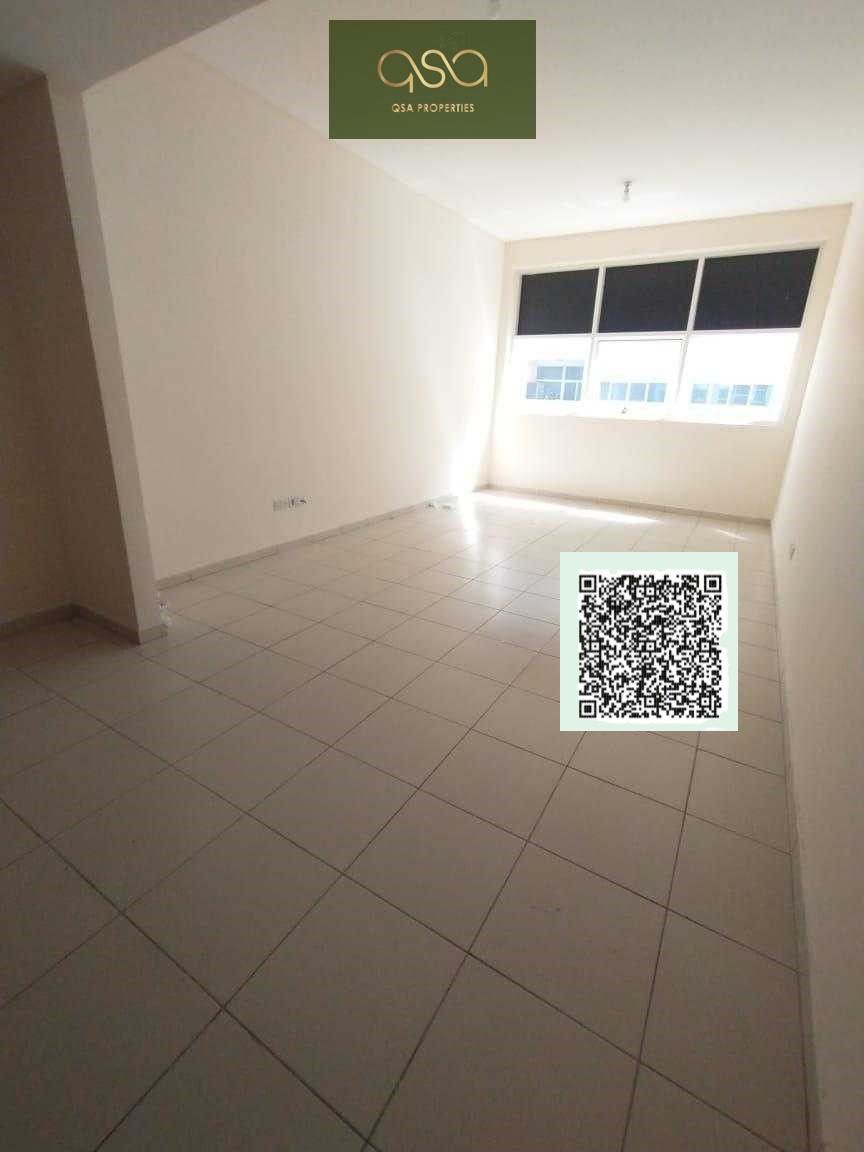 Neat and clean studio with wardrobes, open kitchen, centralized AC, with parking is available for rent in Ajman One Tower, Ajman!