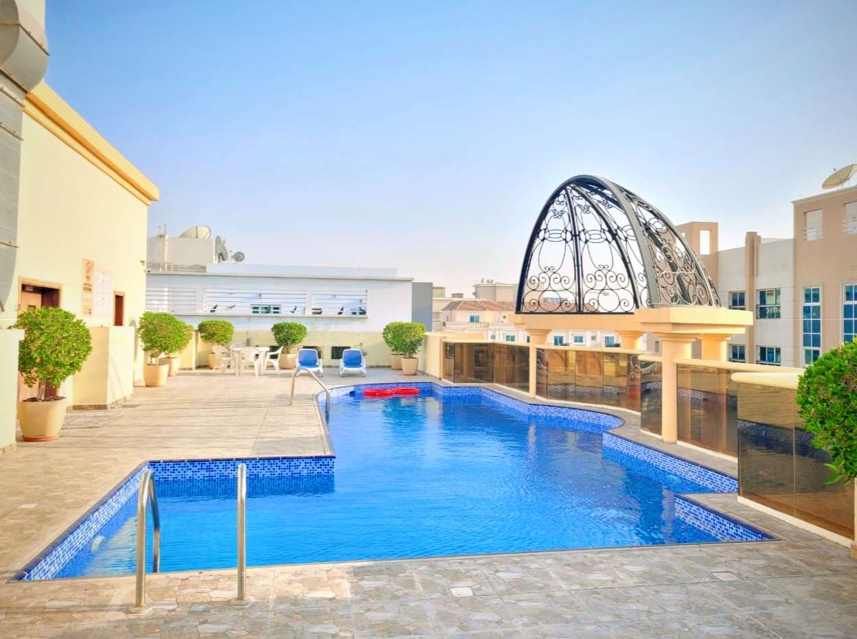 NEAR TO THE EXIT SPACIOUS 2 BEDROOM WITH CLOSED KITCHEN HAVING GYM,POOL AND PARKING.
