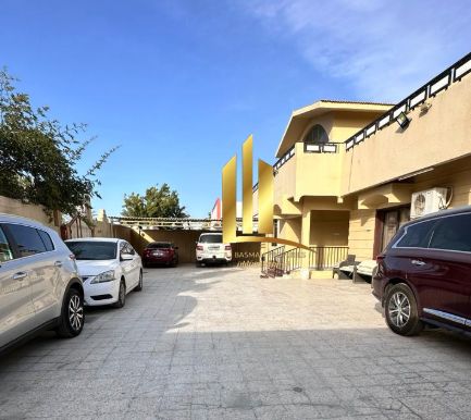 Villa for sale in Sharjah, Al Ghafia area, Al Raqqa suburb, area 8,000 square feet, ground floor + 1.