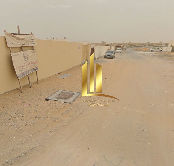 For sale, a fenced plot of land in Al Sajaa Industrial Area - Sharjah, in a very distinguished location on the corner of two streets, behind the cemen
