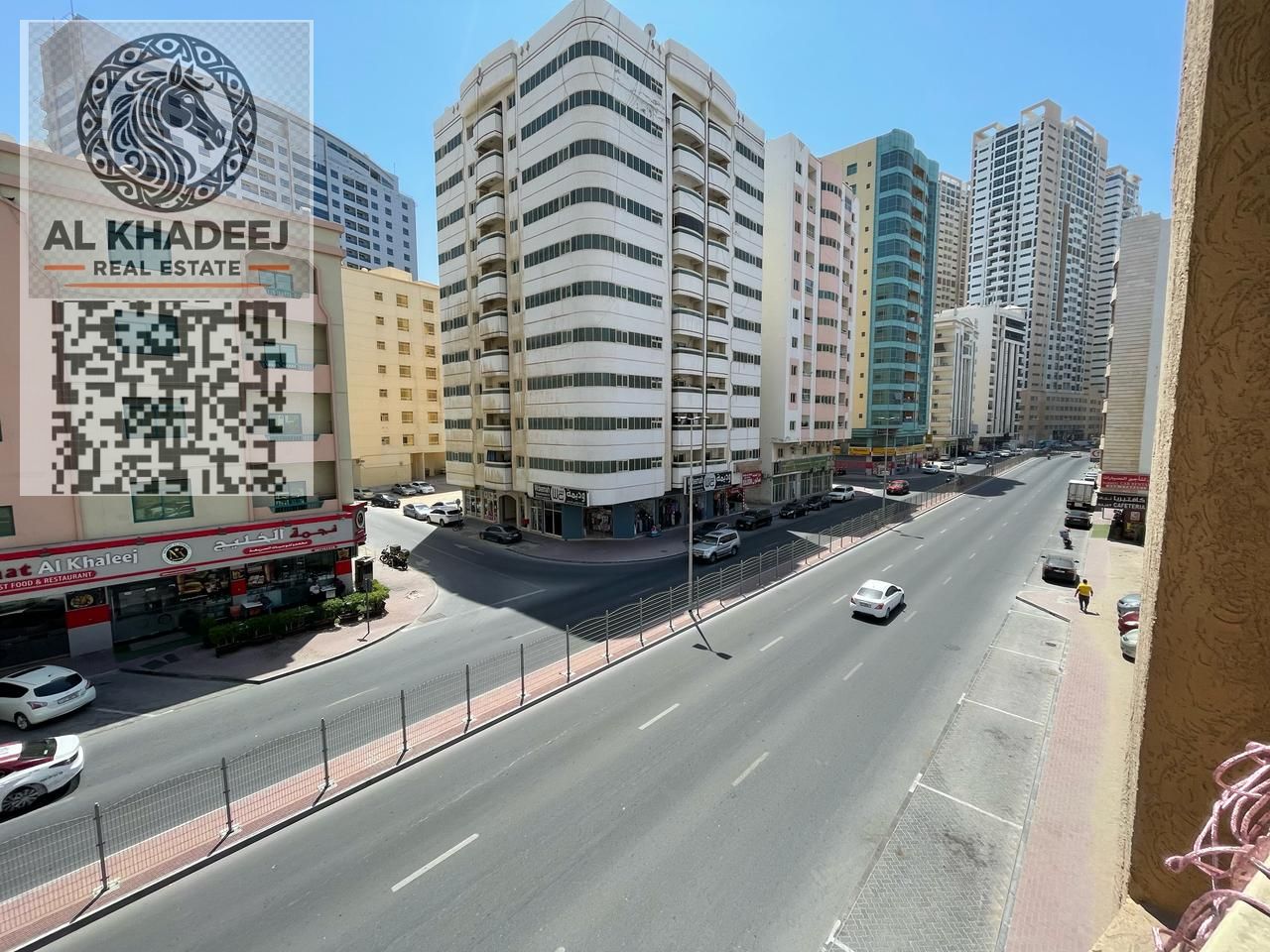 Two rooms and a hall, unfurnished, with a balcony with an open view, in Al Rashidiya 3, Al Muroor Street, close to the Corniche, easy access to Dubai