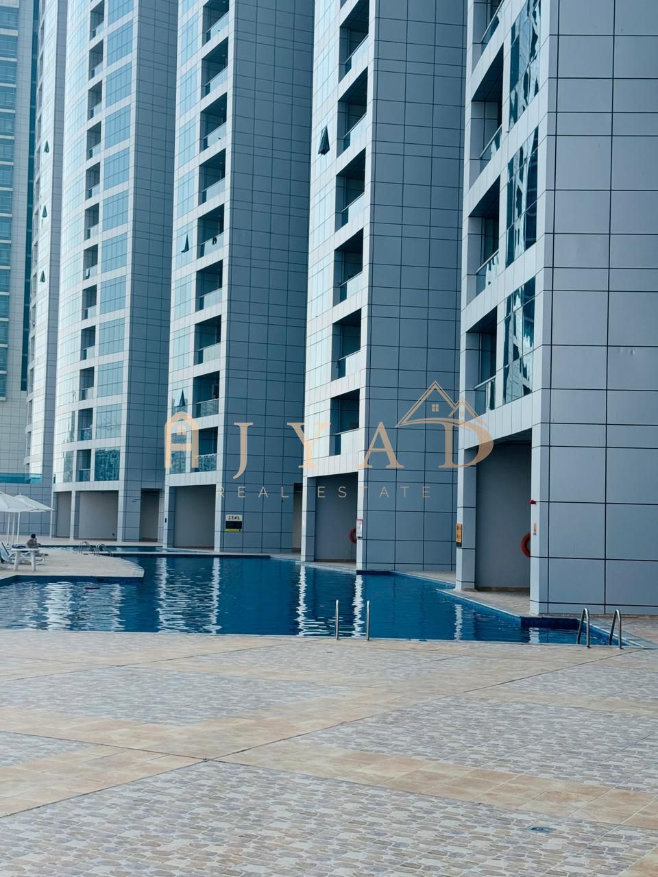 One-bedroom apartment with a living room for cash sale in Corniche Towers Residence with full sea view