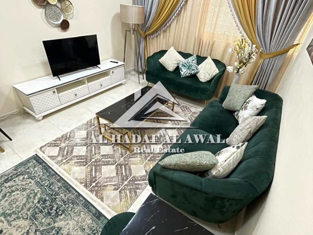 For monthly rent - Luxury apartment, first-floor occupant one bedroom and a hall in al taawun