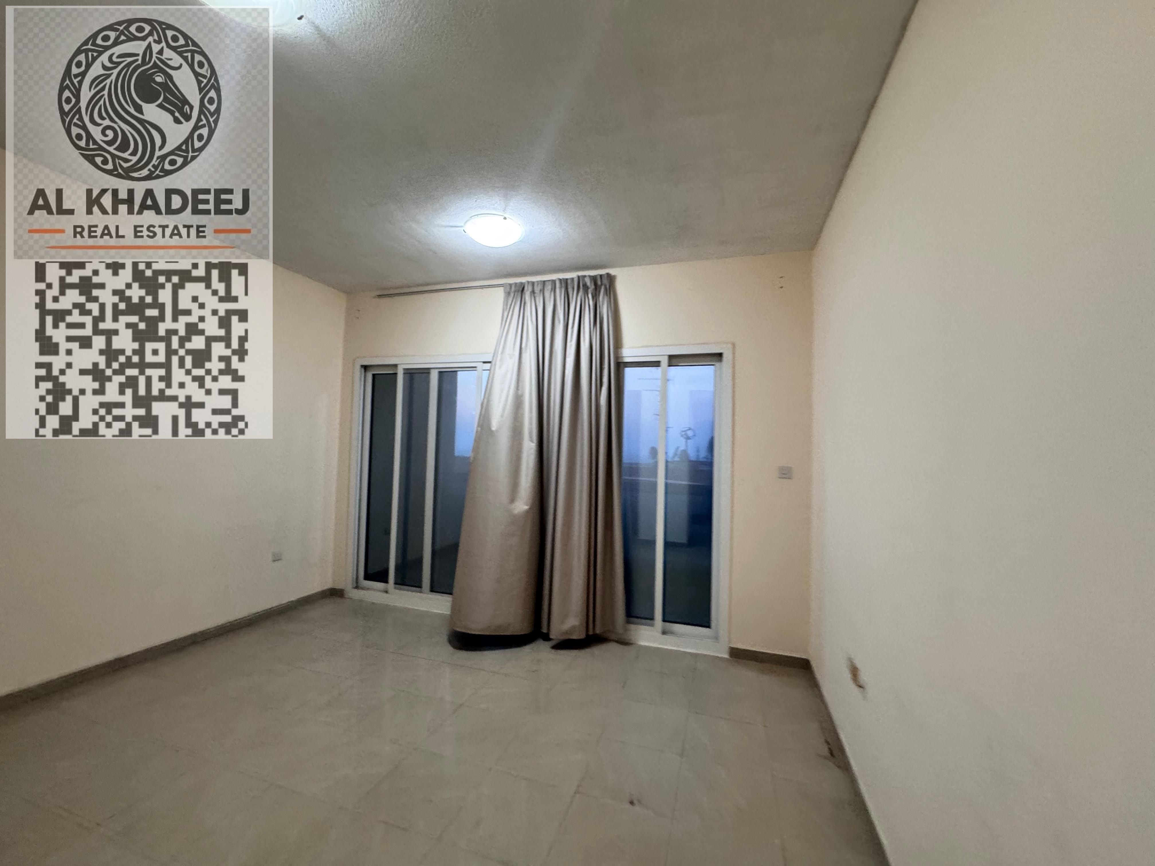 A room, a hall, and a balcony with an open sea view in Al Rashidiya, close to Ajman, and easy access to Dubai and Sharjah