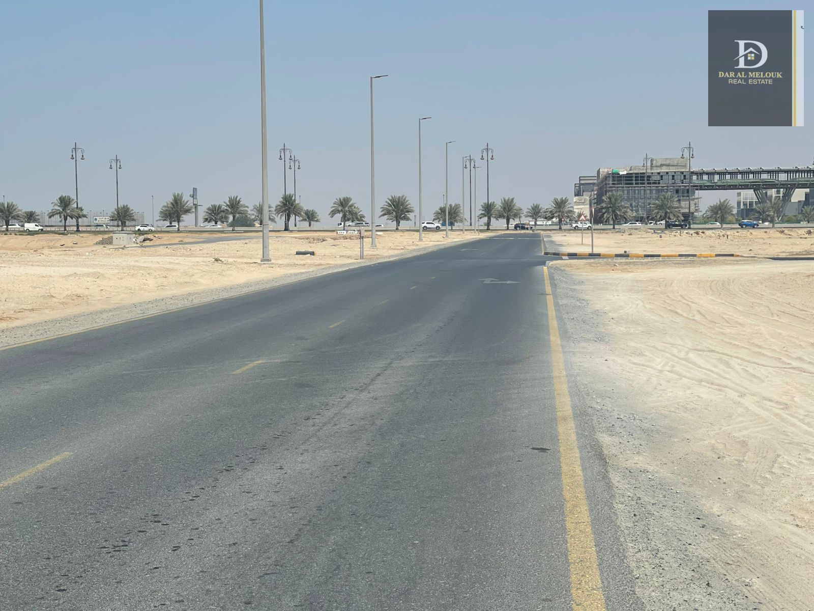 For sale in Sharjah Al Falah Camp 16,953 sq ft commercial/residential plot Very prime location on a 67-meter main street
