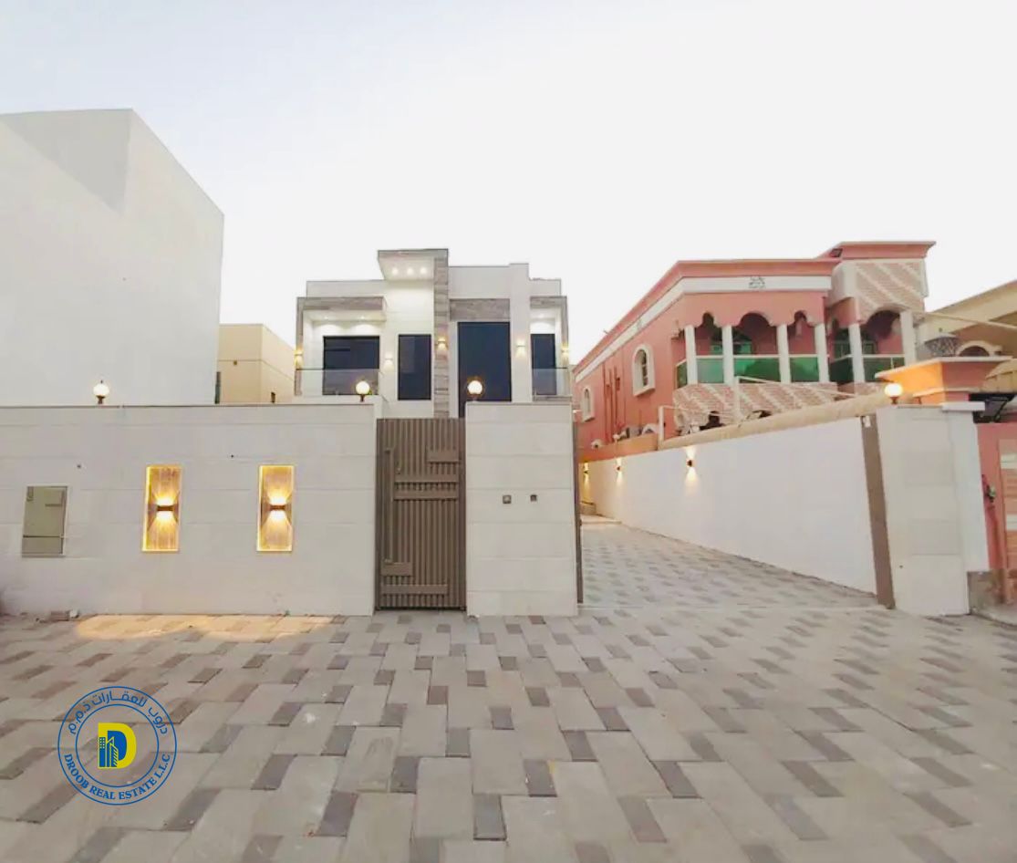 Enjoy the luxury of a luxurious villa for sale in Al Rawda 2, Ajman, 5 rooms with a swimming pool, spacious areas, freehold and bank financing