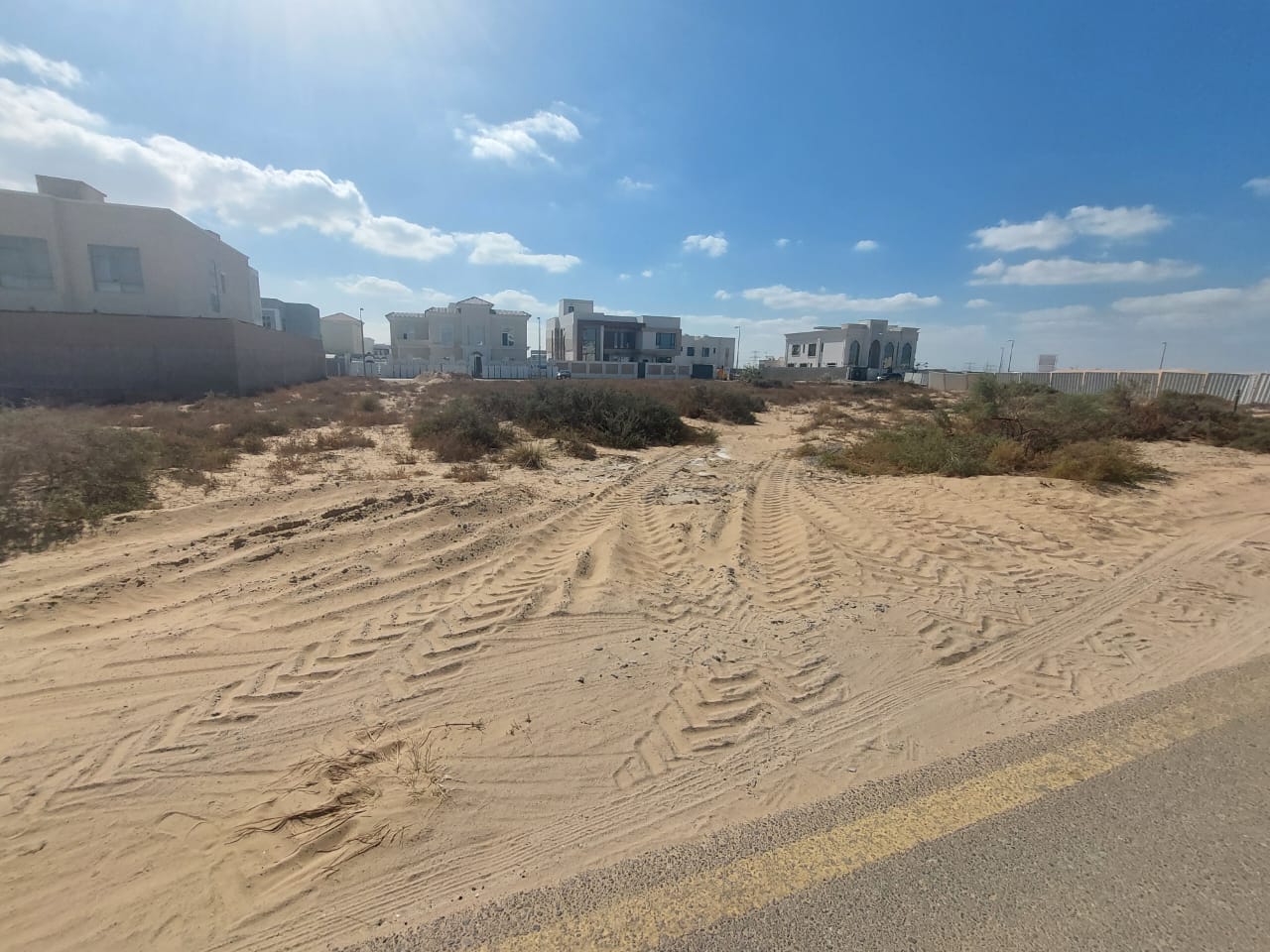 Commercial plot for sale in Al Hoshi area, Al Badia suburb