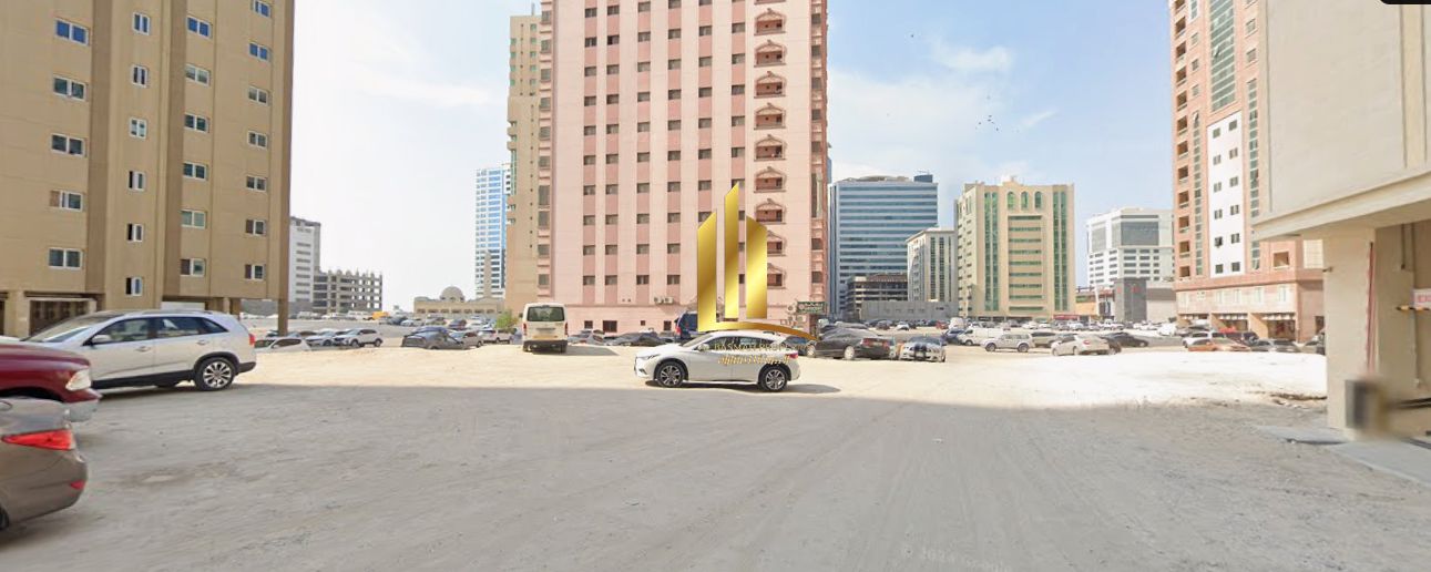 For sale, a distinctive residential and commercial plot in the Al Khan Tourist Area - Sharjah, with an area of 20,000 square feet, with a building p