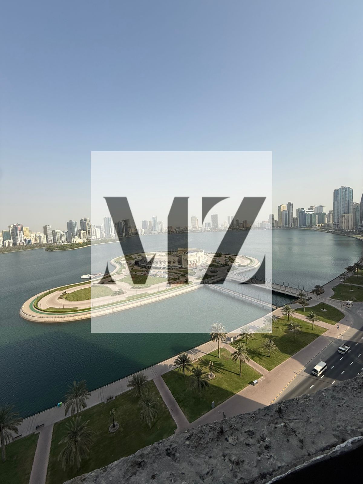 For rent: an apartment in Khaled Tower, Sharjah Corniche, 11th floor, front-facing with a direct view of the lake. It consists of two bedrooms, includ