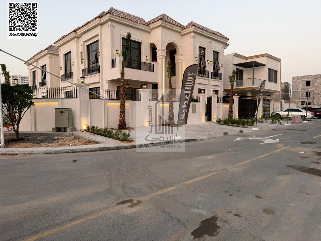 A corner villa with a pool and waterfall for sale in the Al Yasmeen area of Ajman