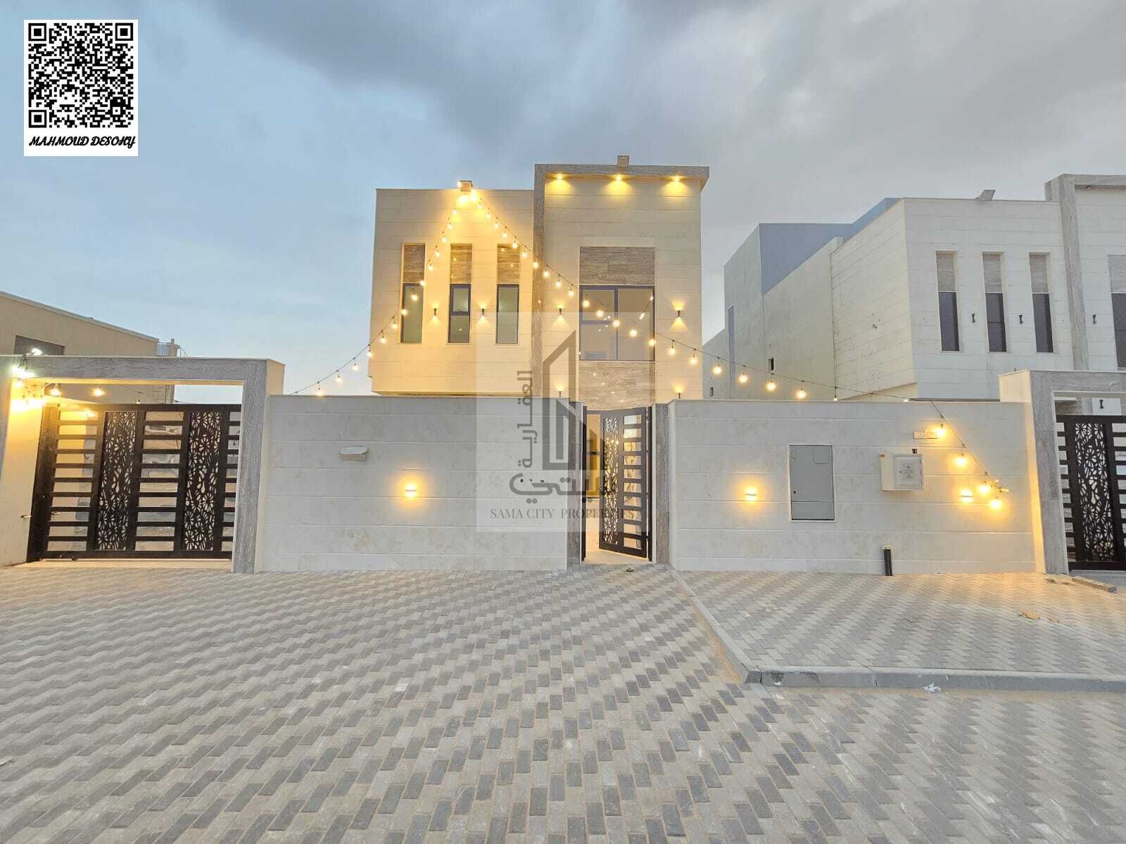 A luxurious villa for sale in Basateen Al Zubair, featuring a modern,