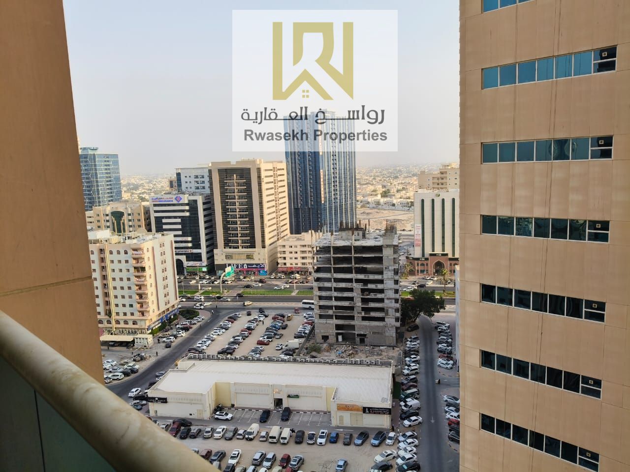 Elegant Urban Living with Garden Serenity & Open Kitchen Charm For Sale: Stylish 1-Bedroom Apartment in Ajman One Towers – 975.1 sq. ft. Step into