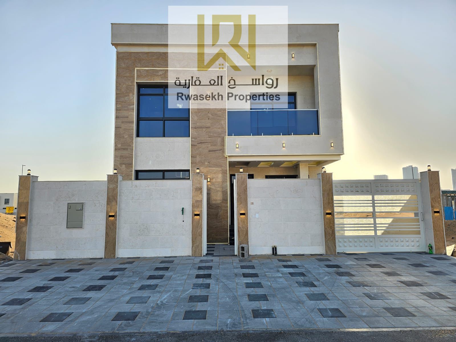 Luxury villa for sale in Ajman Oasis plan 1side Azha near Main Street 3 floors 6 Bedrooms Master Council 2 Lounge Raisi Kitchen and Two