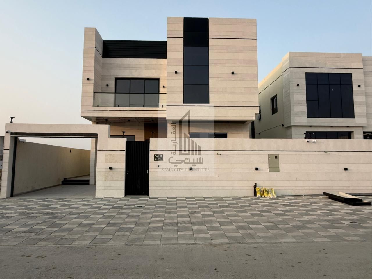 Luxury villa for sale in Ajman, including registration fees.