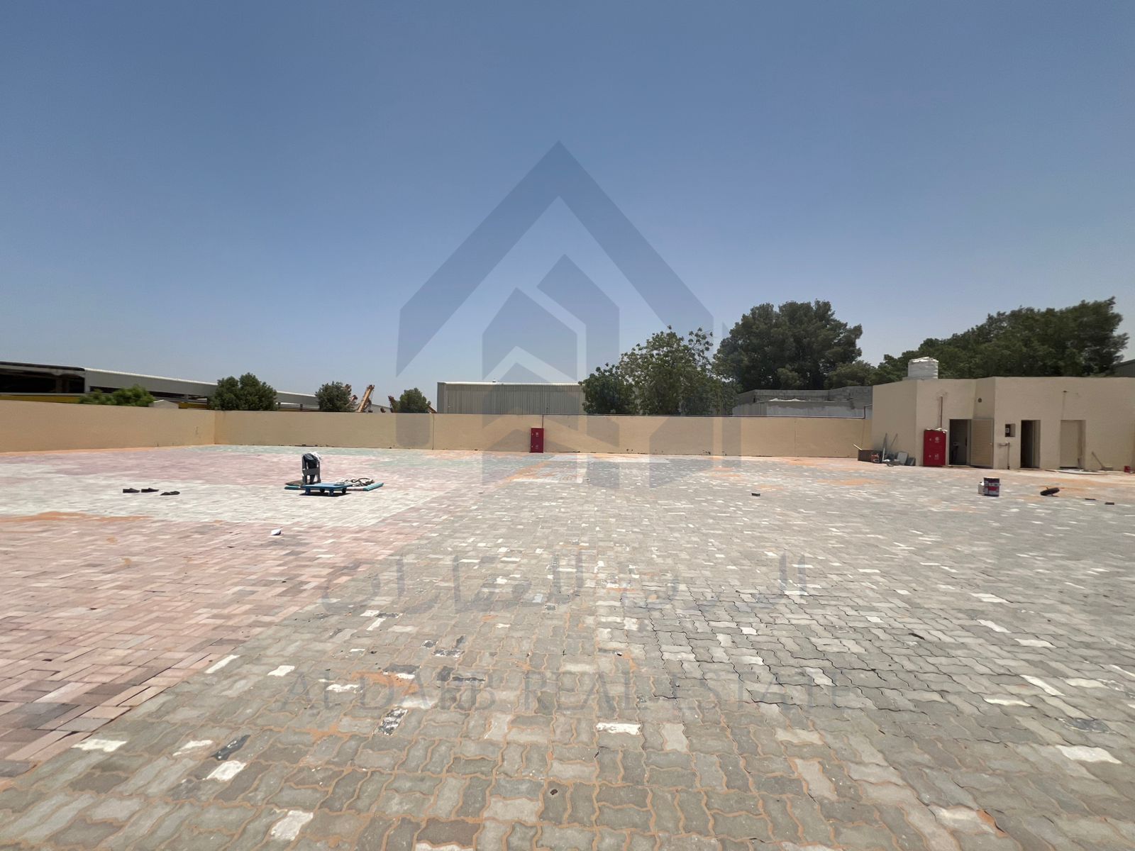 For Sale: Fenced Land of 17,000 sq. ft. in Industrial Area 13 – Rented and Located on a Paved Side Road in a Prime Location