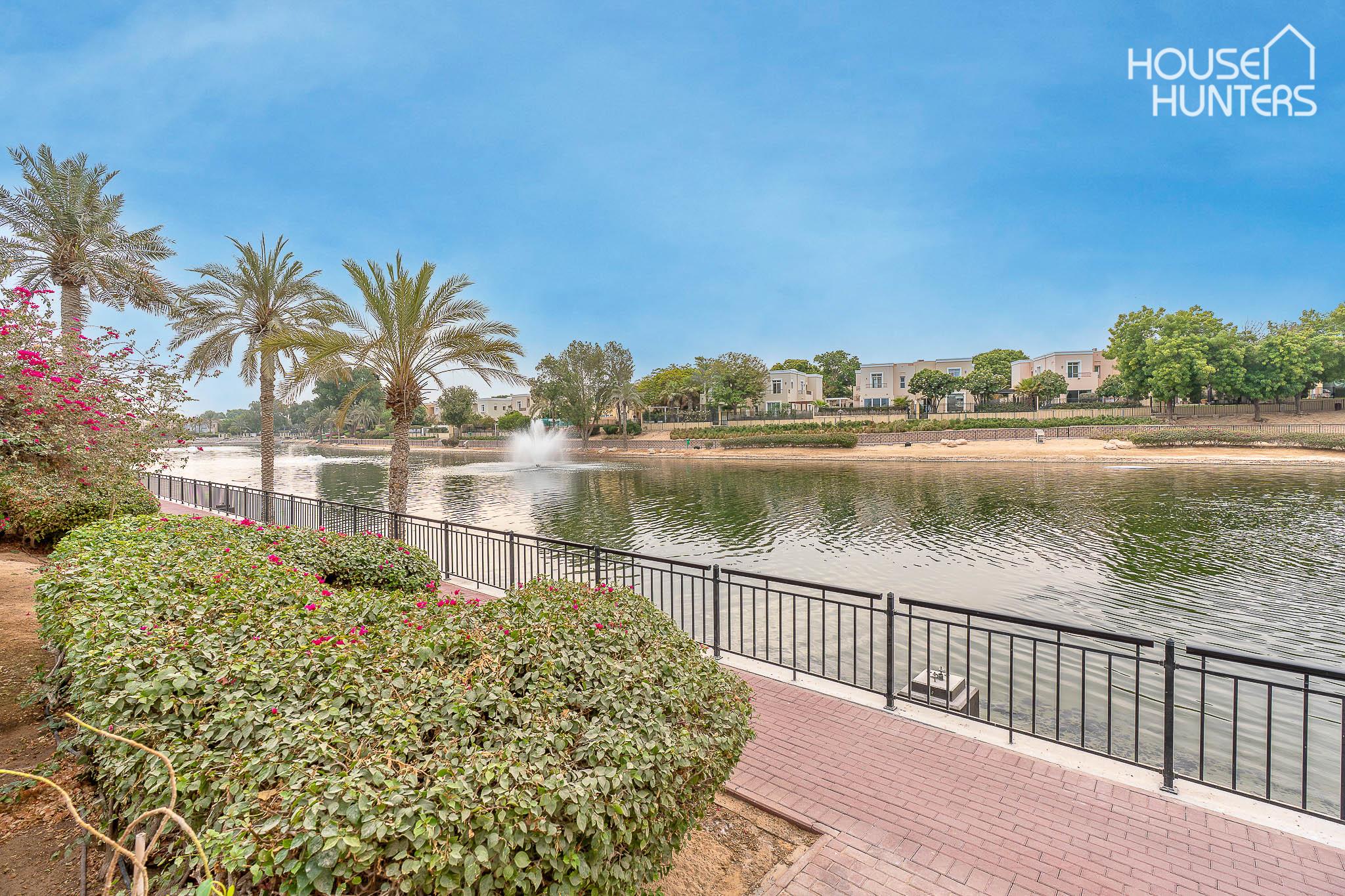 Lake backing corner unit perfect location