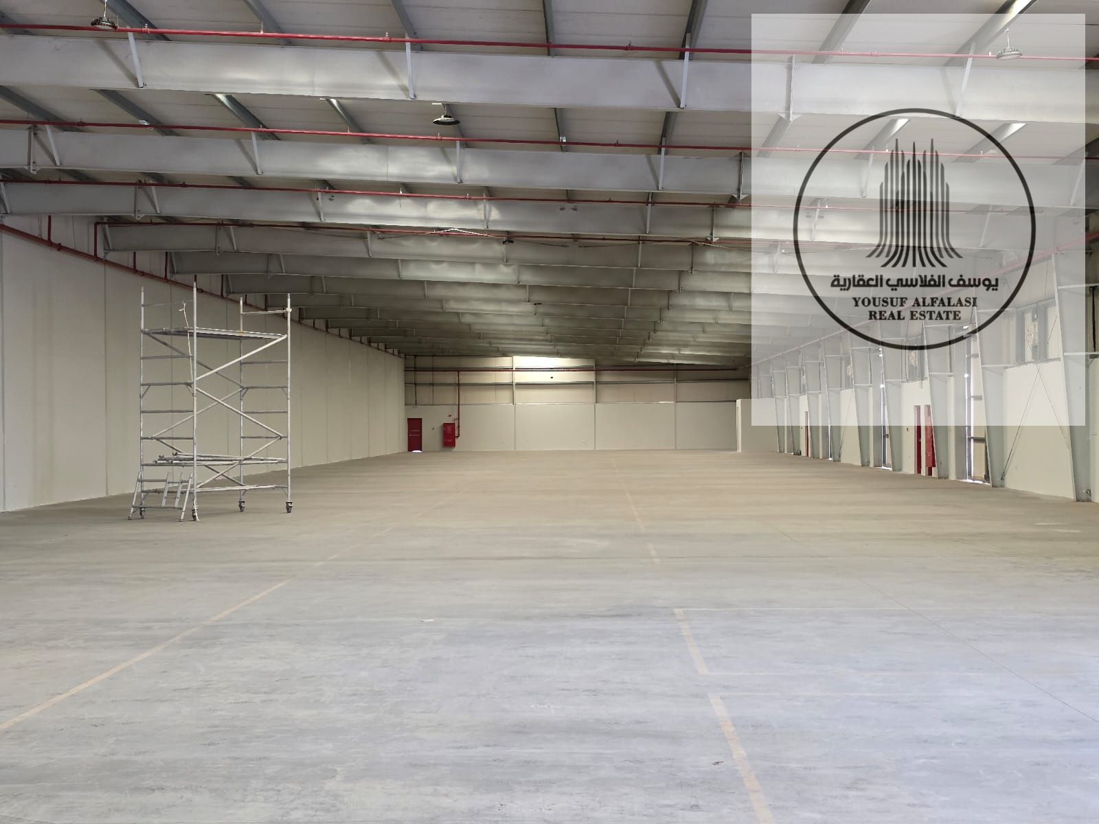 For rent in Al Saja'a, a 23,500-square-foot warehouse with 35 kilowatt electricity, priced at 1,057,500 per year. Ready.