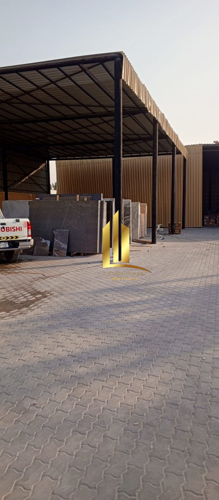 For sale, a distinguished industrial property in a strategic location, with an area of 20,000 square feet, featuring a full interlocking floor, and