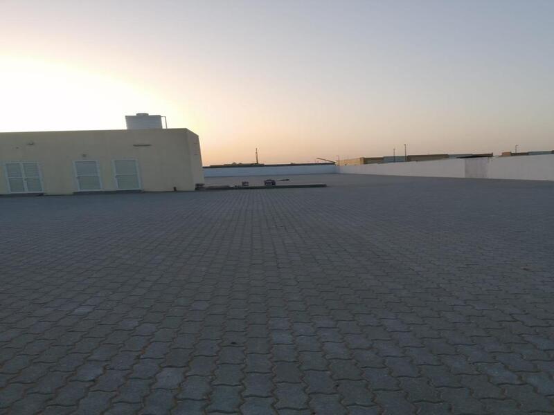 For sale in Sharjah in the Emirates Industrial City in Al Sajaa in a very excellent location on Street 97, a plot of land with an area of 28,000 squ