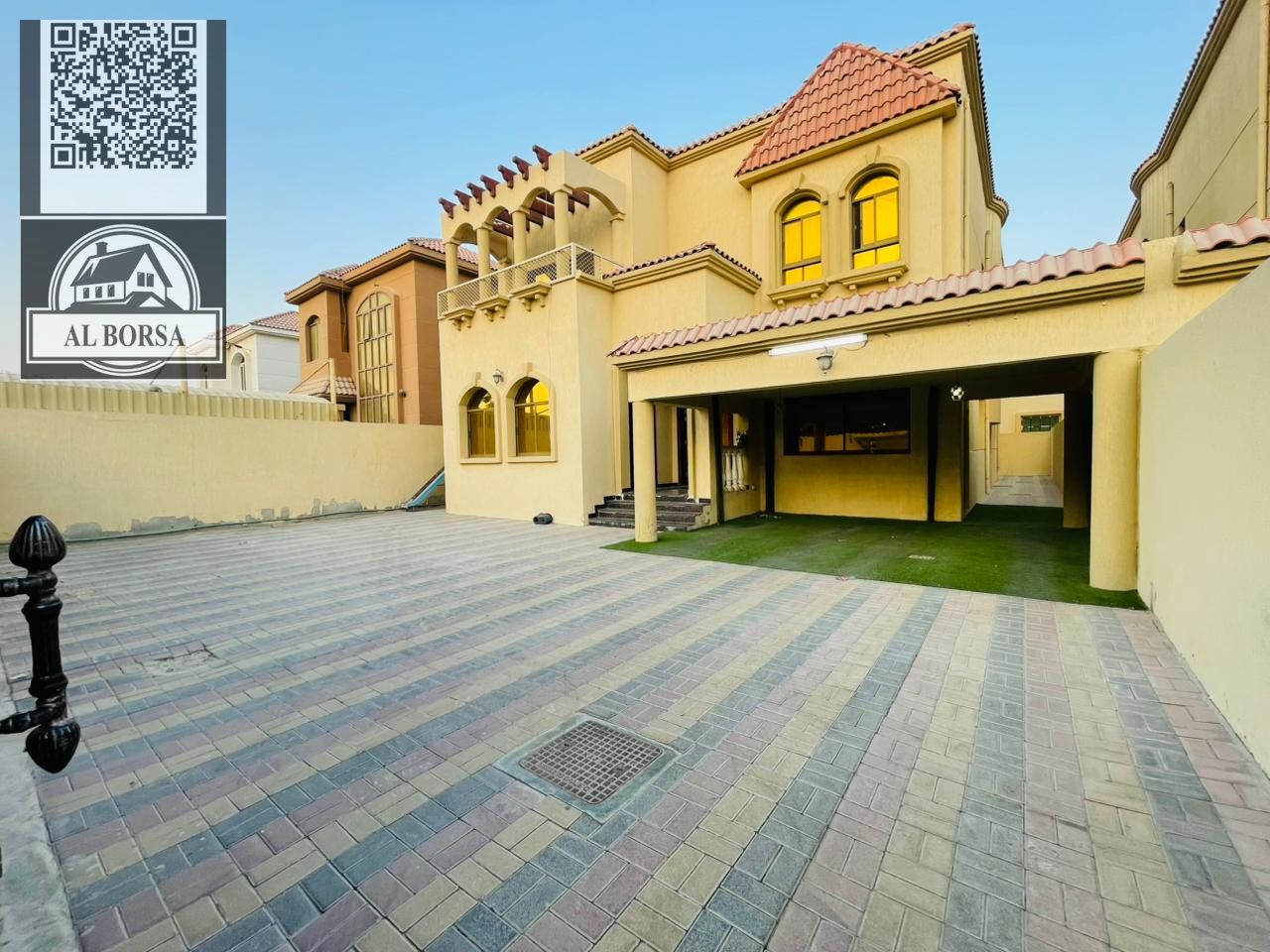 Villa for rent in Ajman Al Muwaihat 2 on the corner of two streets, prime location, 5 master bedrooms, a majlis, a hall, and a maid's room
