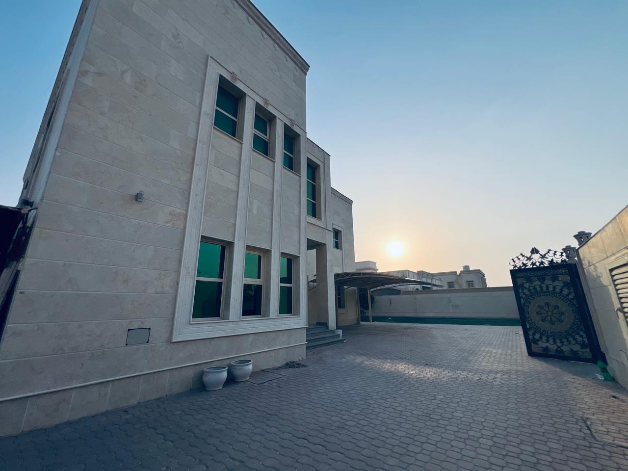 For rent in Rahmaniyah area 7 rooms 9 bathrooms 2 kitchens External garage Carports Area 15,000 Maid's room Close to Emirates Road and all services 190,000