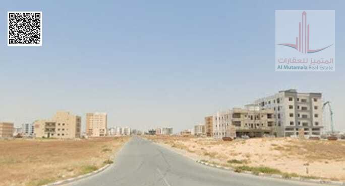 For sale in Ajman, a plot of land in Al Rawda 3, residential and commercial, area 8998 square feet, ground floor permit + 3 corner streets 7500000