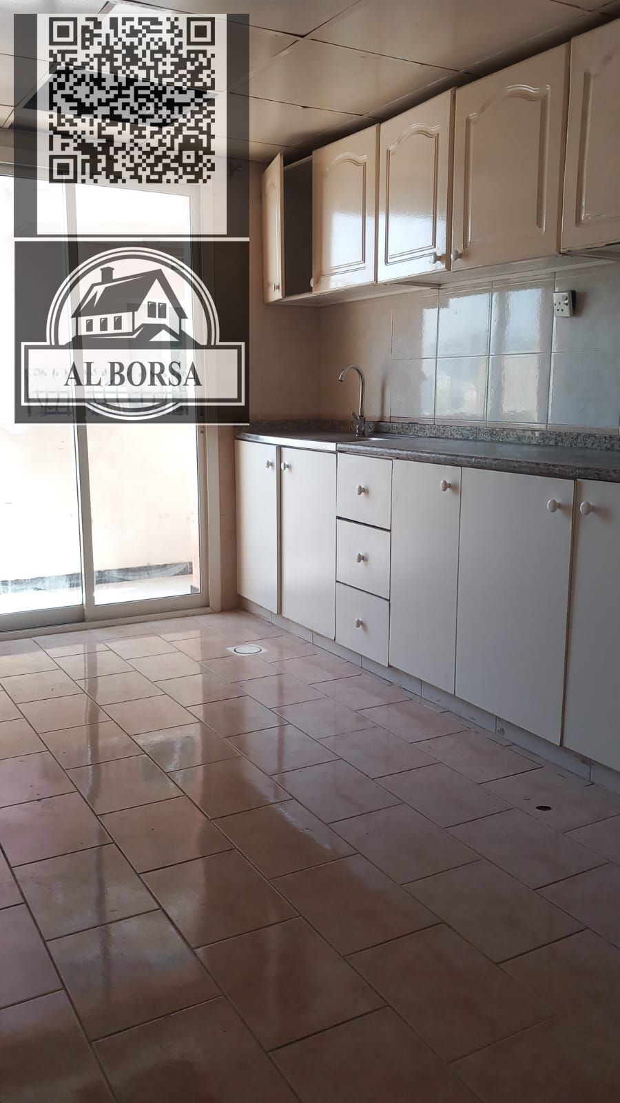 For rent in Rashidiya 2 - Ajman \ One room and a hall, central air conditioning, a large kitchen with a balcony \ At the best price, only 25,000 re