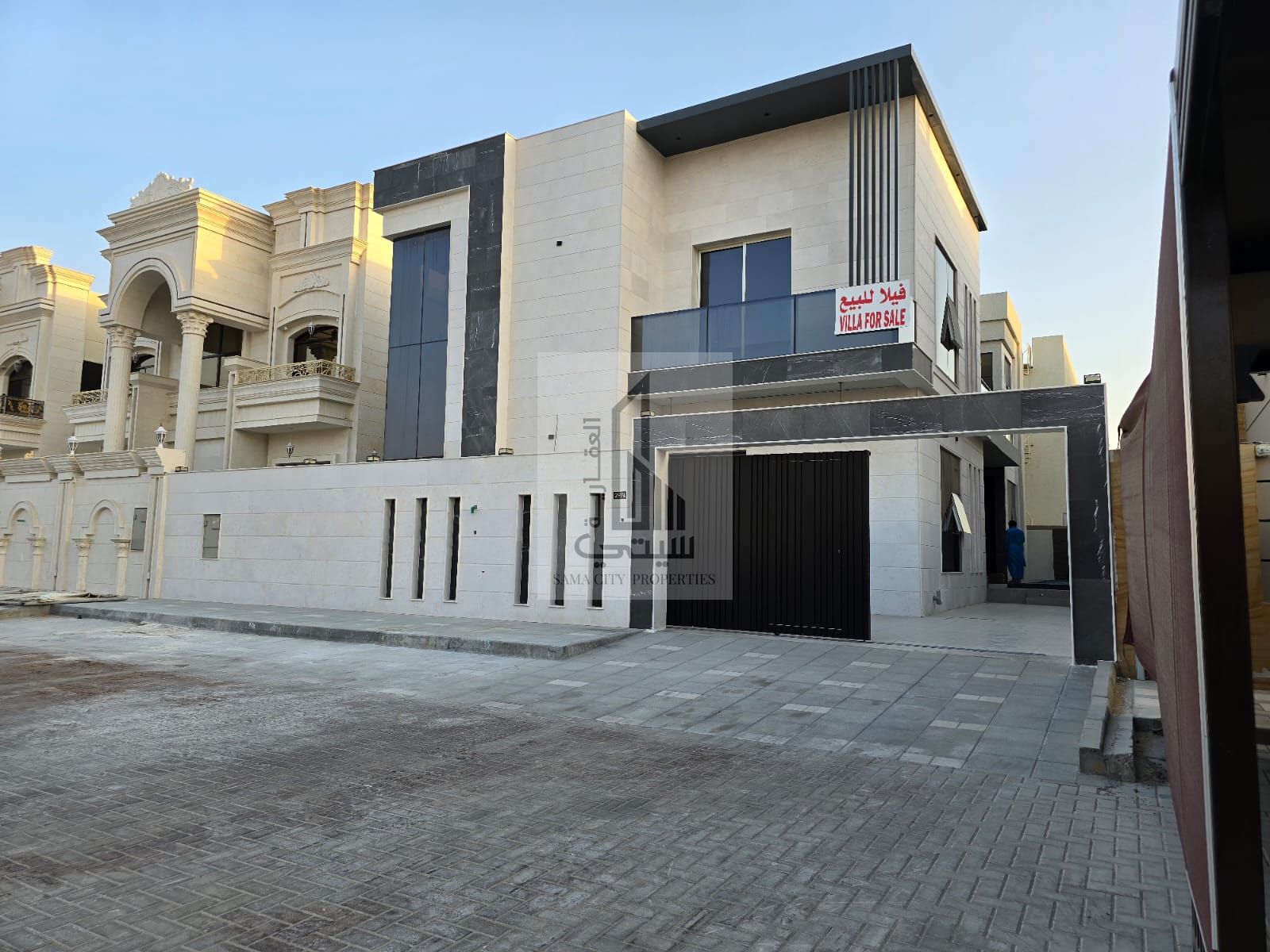 Distinctive villa for sale with the finest finishes and a swimming pool, directly on Sheikh Mohammed bin Zayed Road, behind the Chinese market