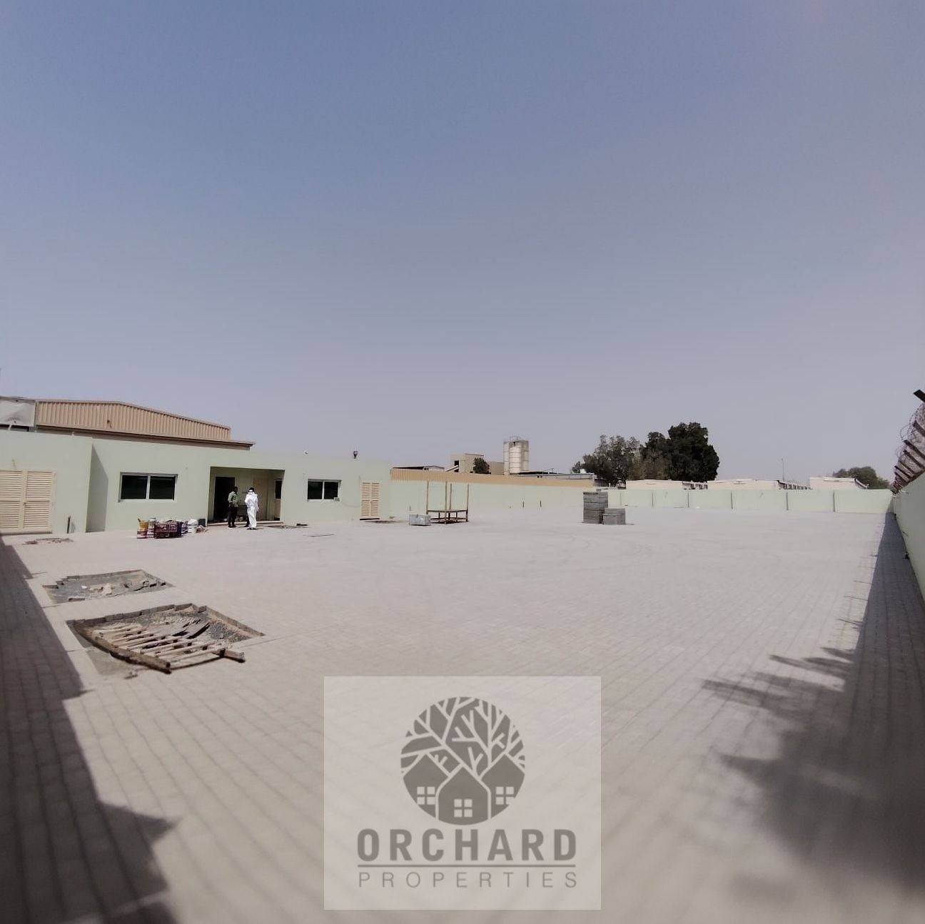 Good location on main road/30Kw power/Full interlock and heighted yard/2 office with washroom and kitchen/20000 sq ft/Rent 290,000