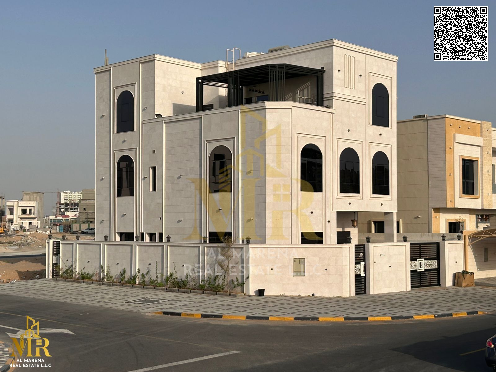 Registration fees included. Luxurious stone villa for sale - corner of two streets | Luxurious design and German finishes - Ajman. Prime location.