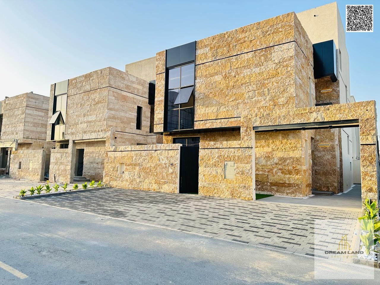 A villa with a price including registration and ownership fees on the main street, ready for living in the most prestigious areas of Ajman, freehold