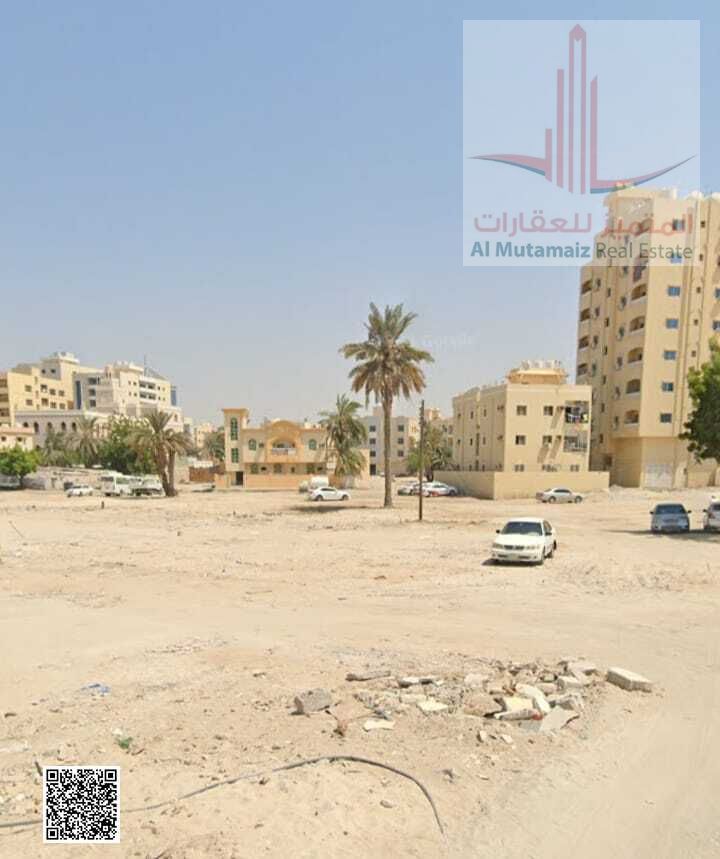 For sale in Ajman, a plot of land in Al Bustan, residential and commercial, ground floor + 3, 5970 feet, Saif Al Hamrani Street, required 1,600,000