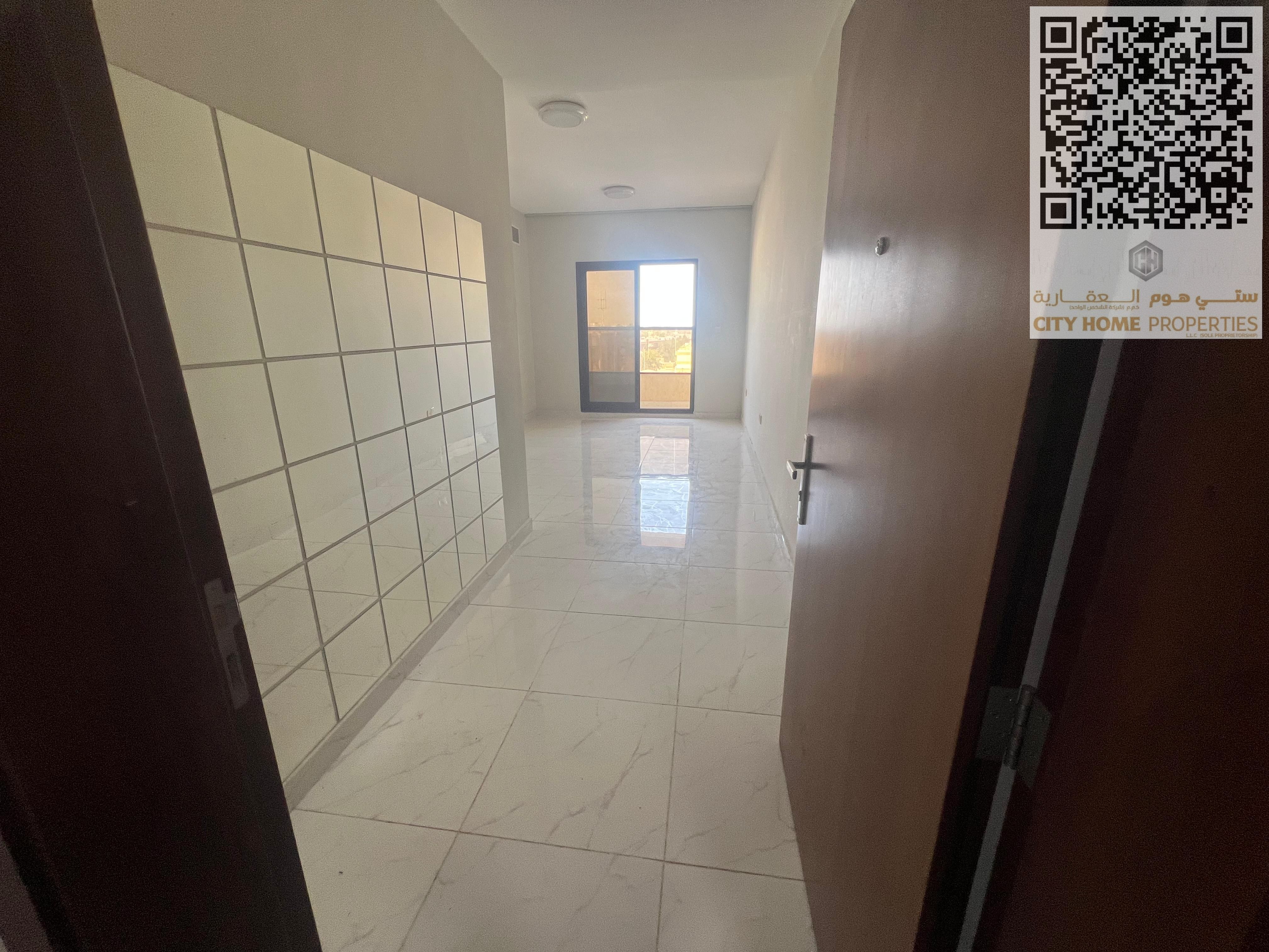 Spacious 1BHK apartment in Al Rawda 1 with built-in wardrobes, very large size, family building, available for annual rent