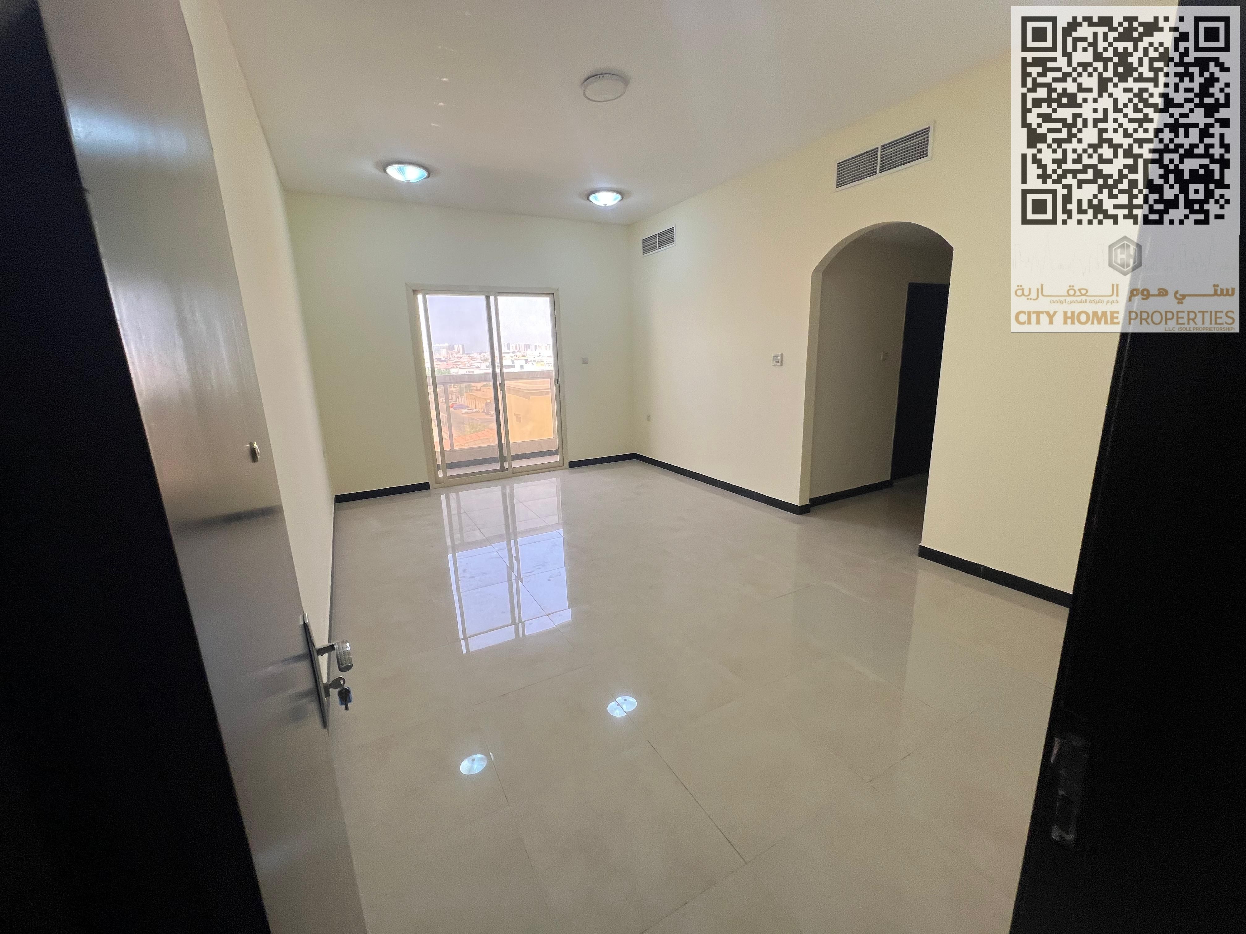 A spacious 1-bedroom apartment with a living room in Al Rawda 3, located on a main street in a very upscale area
