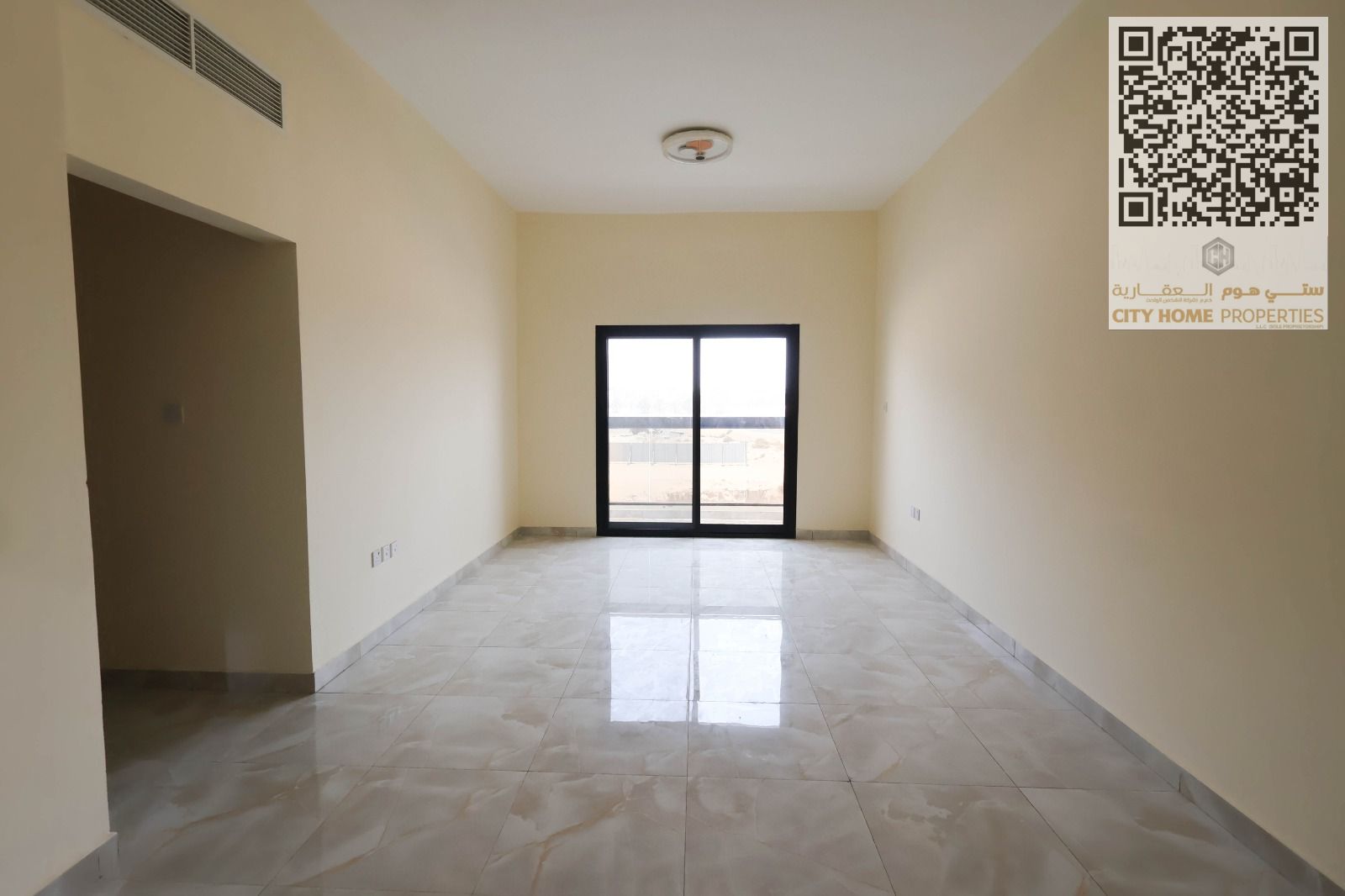 Two-bedroom apartment with a living room, large space, located on Mohammed Bin Zayed Street, family building, available for annual rent in Ajman
