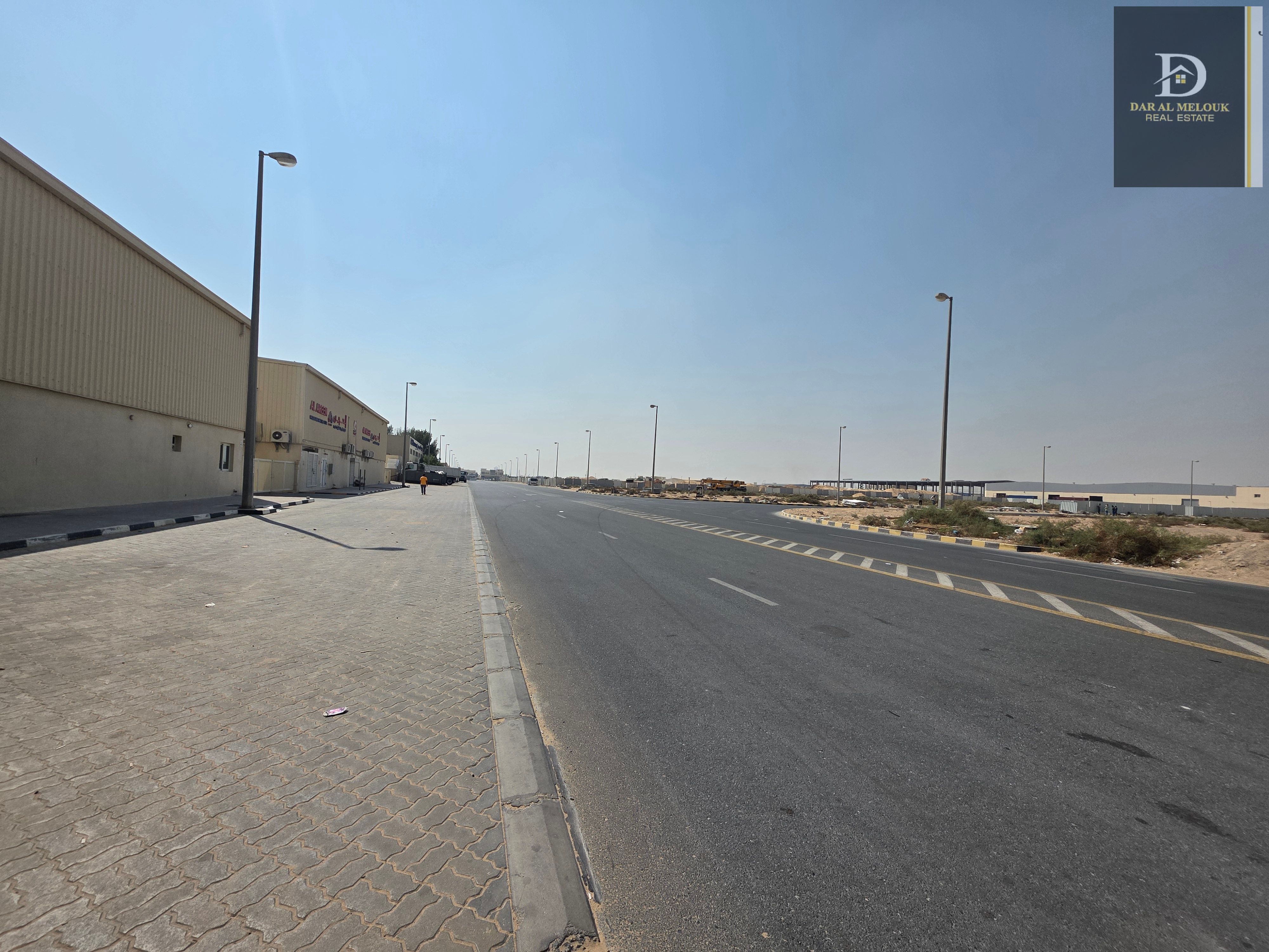 Invest now: A spacious industrial land of 105,000 square feet in Al Sajaa - Zawiya,, strategically located and close to the Emirates Transit Road. .