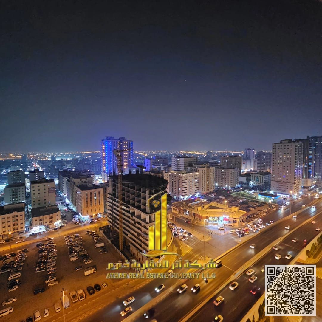 Luxurious two-bedroom apartment with a living room, open view, newly furnished, for monthly rent in Ajman - Al Rashidiya 1 - Gulfa Tower