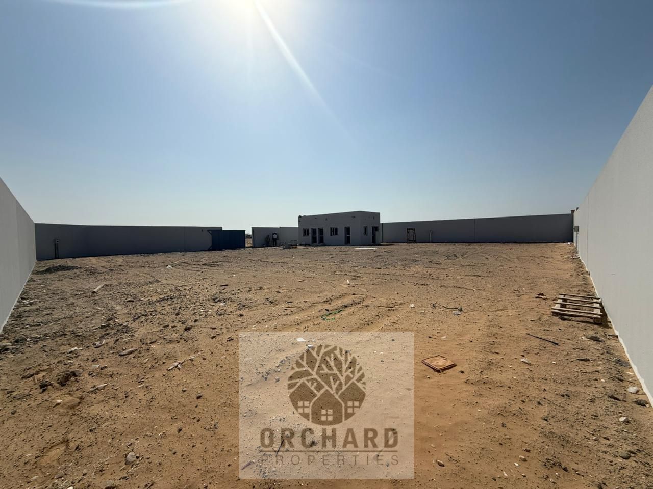 Good location/Next to main road/Without Electricity/Only Sand/Two Office One Kitchen One Washroom/Brand New Yard/Rent 65,000 Aed /10000 Scft