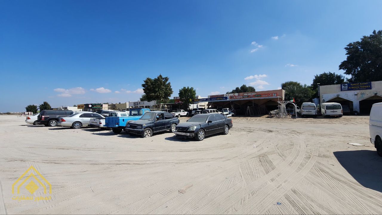 For sale: Commercial property in UAQ - Al Raafah, 4 shops + labor rooms, fully rented, prime location