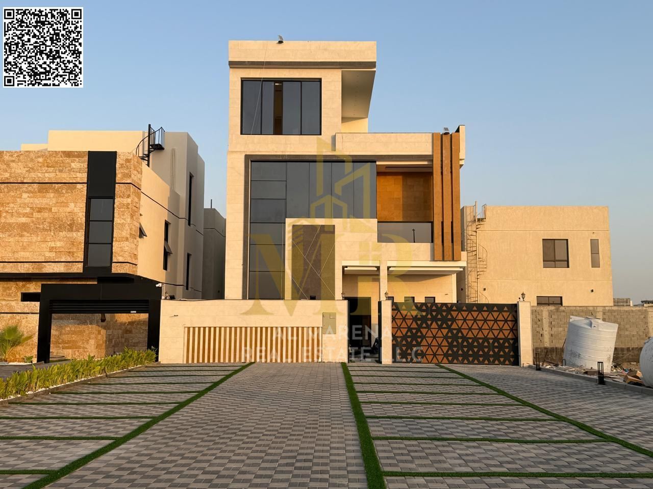 For sale: Luxurious villa with a modern design in Al Bahia area - Ajman | Two floors + roof | 6 master bedrooms | Registration and ownership fees incl