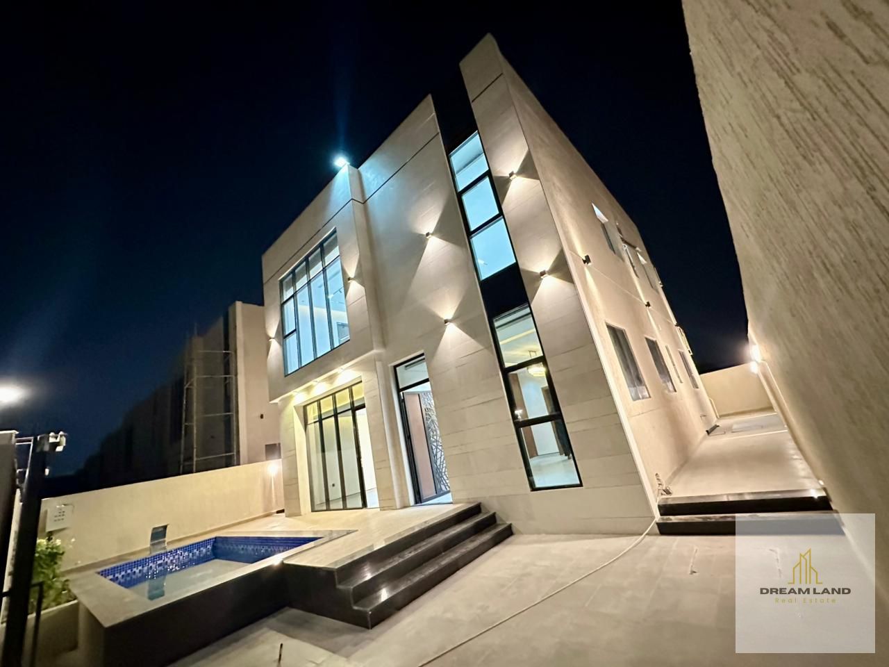 A luxurious modern villa with a swimming pool, two floors, including registration and ownership fees, high-end finishes, and freehold for all national