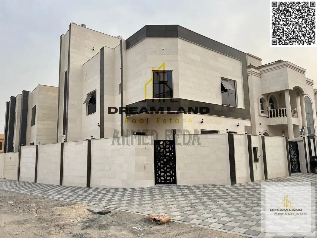Two-story corner villa with a roof for sale in Al-Yasmeen, behind the garden